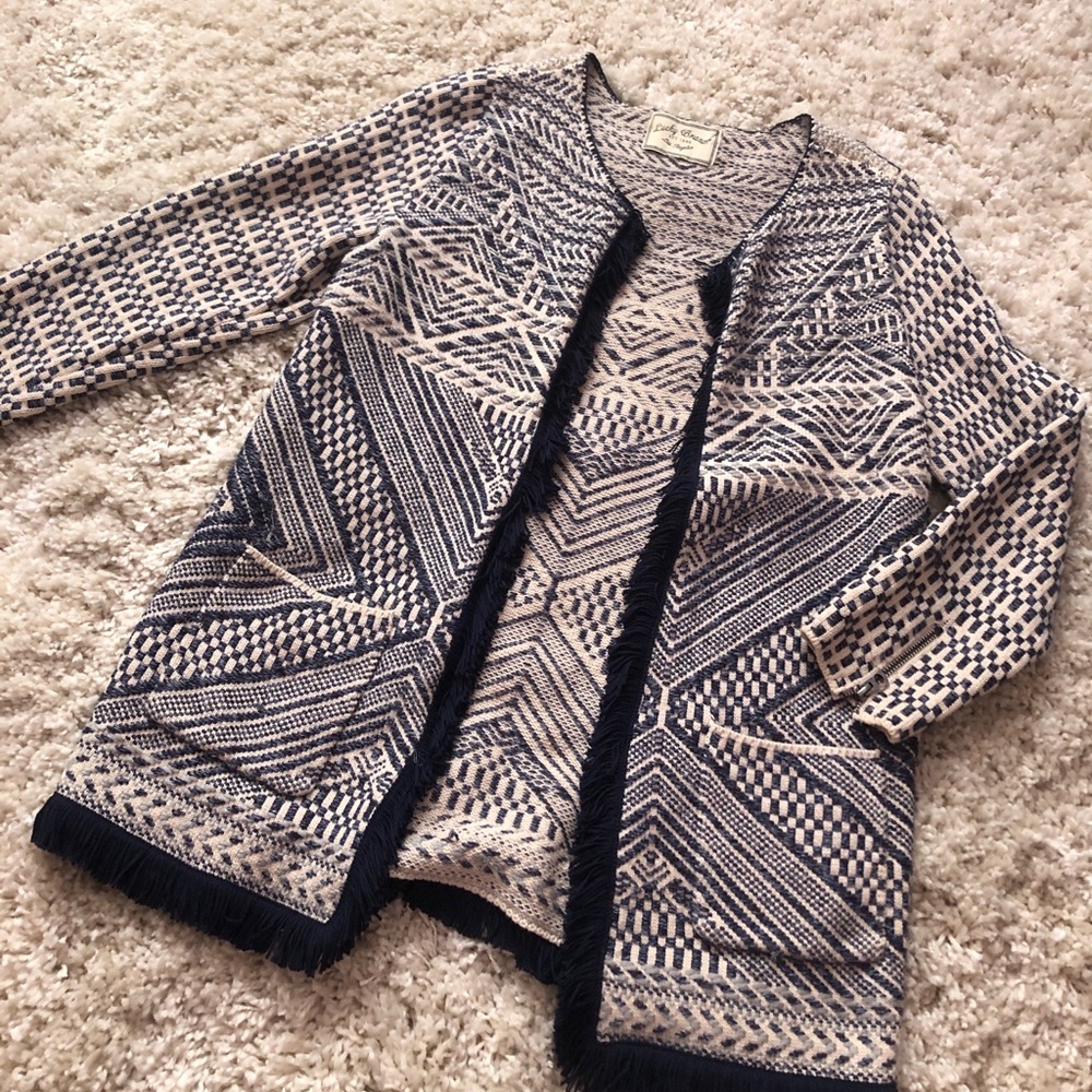 white and blue patterned cardigan